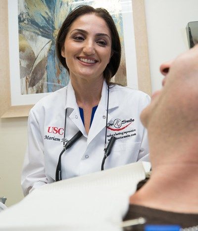 Dr. Mariam Nadi with a patient